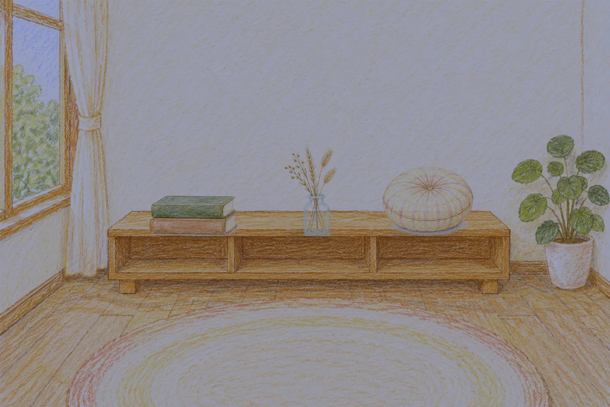 남양주 여성전용 스웨디시 홈케어 안내 그림, 밤의 창가 낮은 선반 위에 놓인 책 두 권, 마른 풀을 꽂은 항아리, 둥근 쿠션